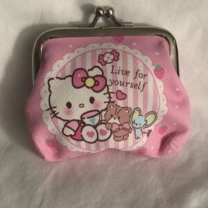 Hello Kitty coin purse live for yourself graphics with kiss lock closure.